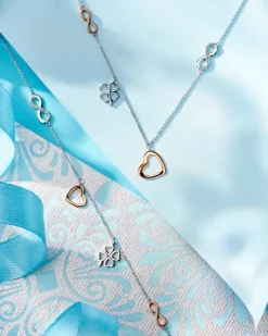 Apart Bransoletka z białego i różowego złota z diamentami - serce, nieskończoność, koniczyna - 0,01 ct - próba 375< Bransoletki Z Diamentami