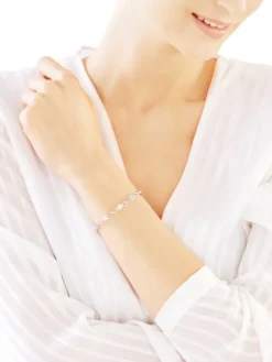 Discount Apart Bransoletka z białego złota z diamentami i topazami białymi - 18 cm - próba 375