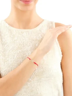 Sale Apart Bransoletka z elementami żółtego złota i diamentami - nieskończoność, serce - 0,01 ct - próba 375