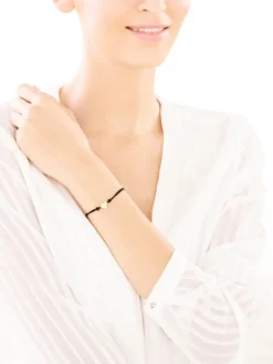 Outlet Apart Bransoletka z elementami żółtego złota i brylantem - serce - 0,008 ct - próba 375