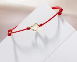 Apart Bransoletka z elementami żółtego złota i diamentem - serce - 0,004 ct - próba 375< Bransoletki Z Diamentami