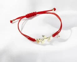 Apart Bransoletka z elementami żółtego złota i diamentem - róża, serce - 0,005 ct - próba 375< Wszystkie