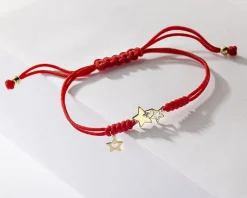 Sale Apart Bransoletka z elementami żółtego złota i diamentem - gwiazdy - 0,005 ct - próba 585