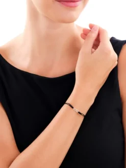 Apart Bransoletka z elementami żółtego złota z diamentami - nieskończoność - 0,08 ct - próba 375< Bransoletki Z Diamentami