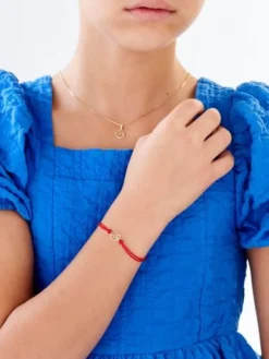 Apart Bransoletka z elementami żółtego złota i diamentem - litera M - 0,003 ct - próba 375< Wszystkie