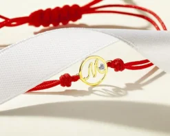 Apart Bransoletka z elementami żółtego złota i diamentem - litera M - 0,003 ct - próba 375< Wszystkie