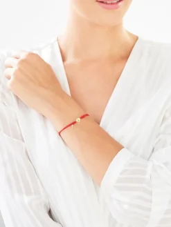 Apart Bransoletka z elementami z żółtego złota z diamentem - serce, kluczyk, kłódka - 0,003 ct - próba 375< Bransoletki Z Diamentami