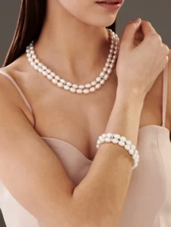 Apart Bransoletka z perłami, diamentami i elementami białego złota - próba 585< Bransoletki Z Diamentami