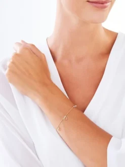 Online Apart Bransoletka z żółtego złota z diamentami - serce, nieskończoność, koniczyna - 0,01 ct - próba 375