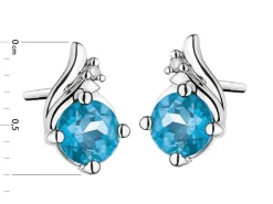 Discount Apart Kolczyki z białego złota z diamentami i topazami London Blue - próba 375