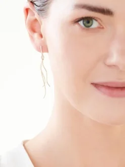 Outlet Apart Kolczyki z żółtego i białego złota z diamentami - 0,006 ct - próba 585