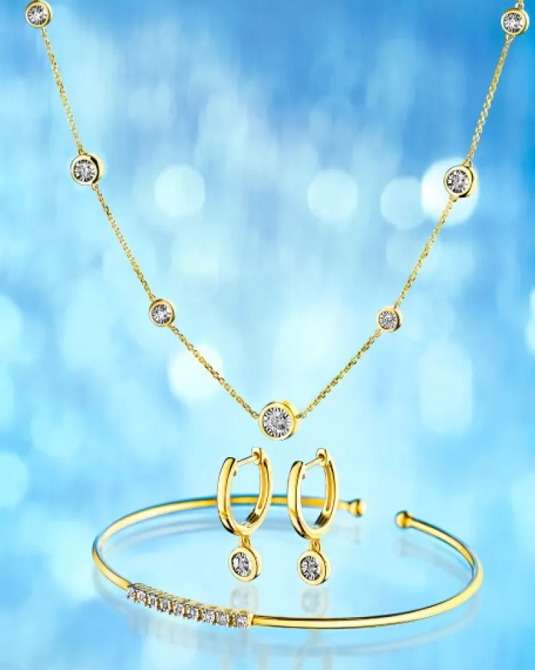 Hot Apart Kolczyki z żółtego i białego złota z brylantami - 0,05 ct - próba 375