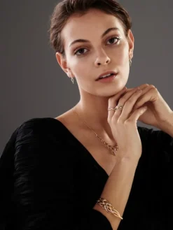 Apart Kolczyki z żółtego złota z diamentami - 0,02 ct - próba 585< Wszystkie