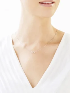 Apart Naszyjnik z białego złota z diamentem - nieskończoność - 0,004 ct - próba 585< Naszyjniki