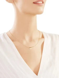 Apart Naszyjnik z żółtego złota z brylantem - serce - 0,008 ct - próba 585< Naszyjniki