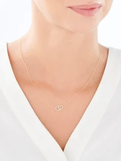 Apart Naszyjnik z żółtego złota z diamentami - serca - 0,10 ct - próba 585< Naszyjniki