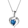 Sale Apart Zawieszka z białego złota z diamentem i topazem London Blue - serce - próba 375