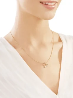 Apart Zawieszka z żółtego złota z brylantami - serca - 0,01 ct - próba 585< Zawieszki