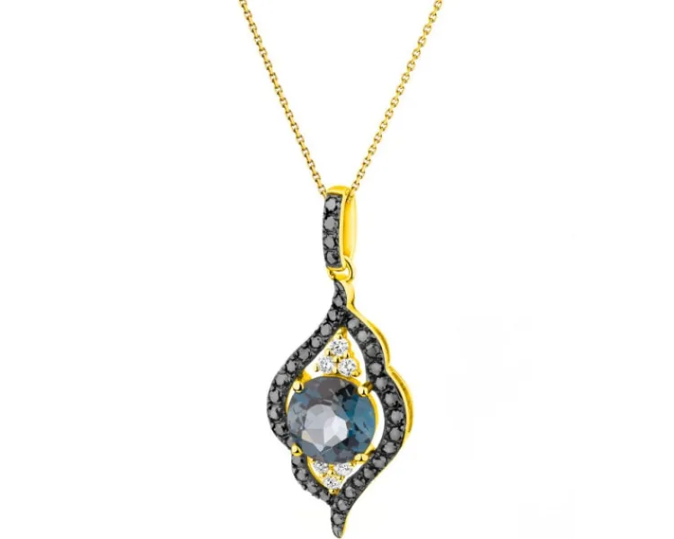Outlet Apart Zawieszka z żółtego złota z brylantami i topazem London Blue - próba 585