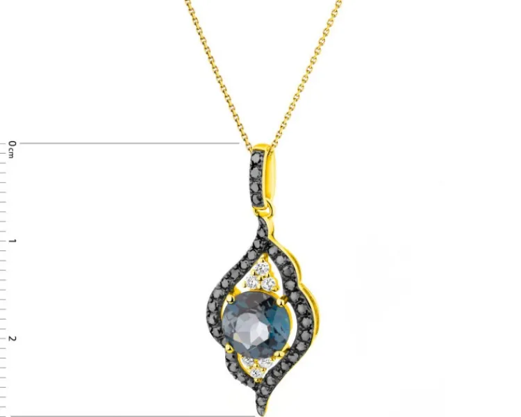 Outlet Apart Zawieszka z żółtego złota z brylantami i topazem London Blue - próba 585