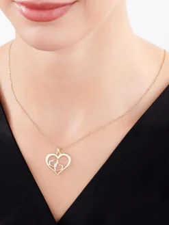 Discount Apart Zawieszka z żółtego złota z diamentami - serca - 0,01 ct - próba 375