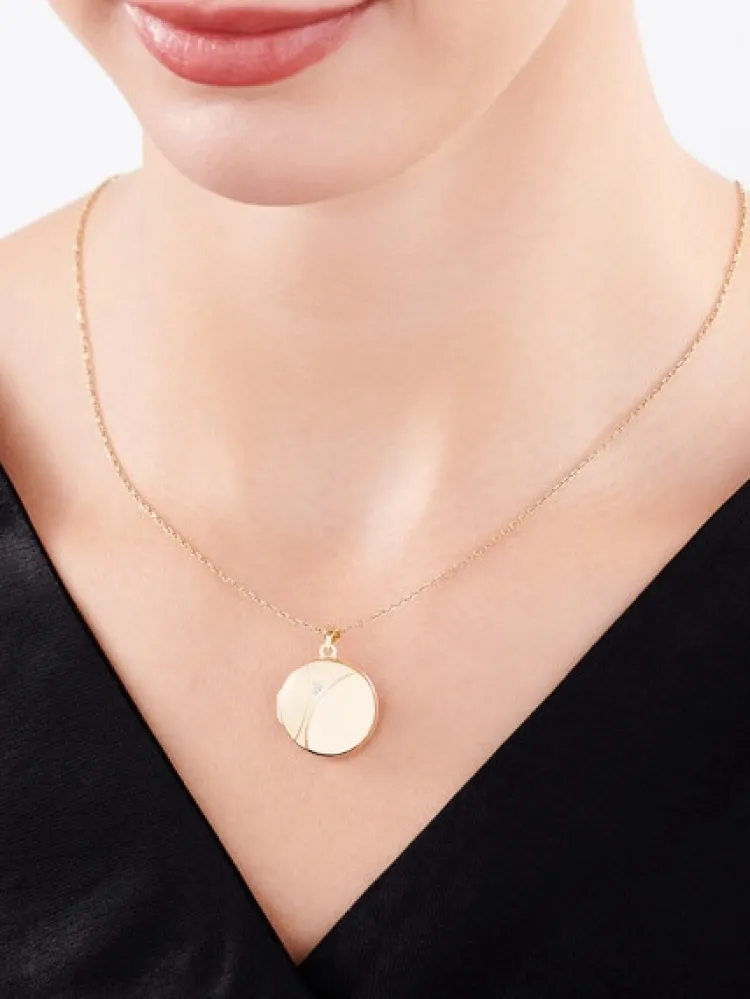 Apart Zawieszka z żółtego złota z diamentem - puzderko - 0,005 ct - próba 375< Zawieszki