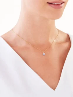 Outlet Apart Zawieszka z żółtego złota z diamentami i tanzanitem - próba 585
