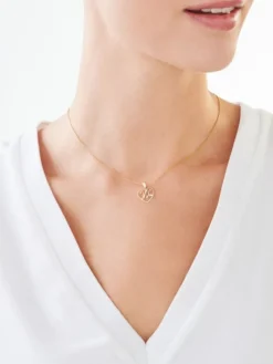 Discount Apart Zawieszka z żółtego złota z diamentem - litera W, serce - 0,005 ct - próba 585