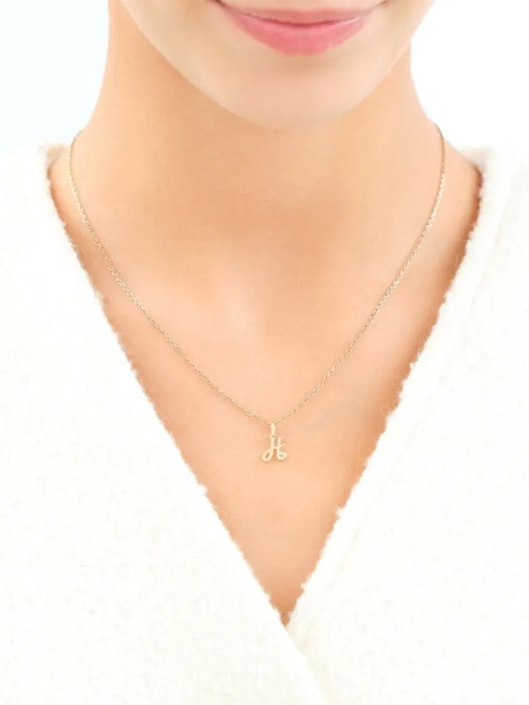 Apart Zawieszka z żółtego złota z diamentem - litera H - 0,003 ct - próba 375< Wszystkie