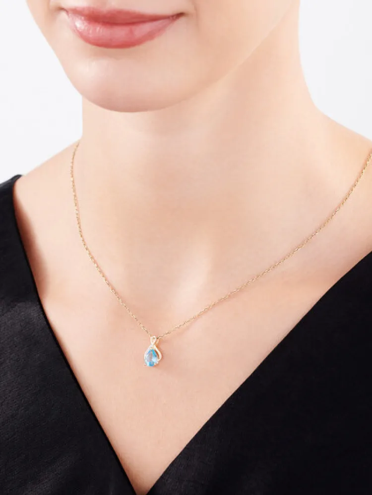 Discount Apart Zawieszka z żółtego złota z diamentami i topazem - próba 375