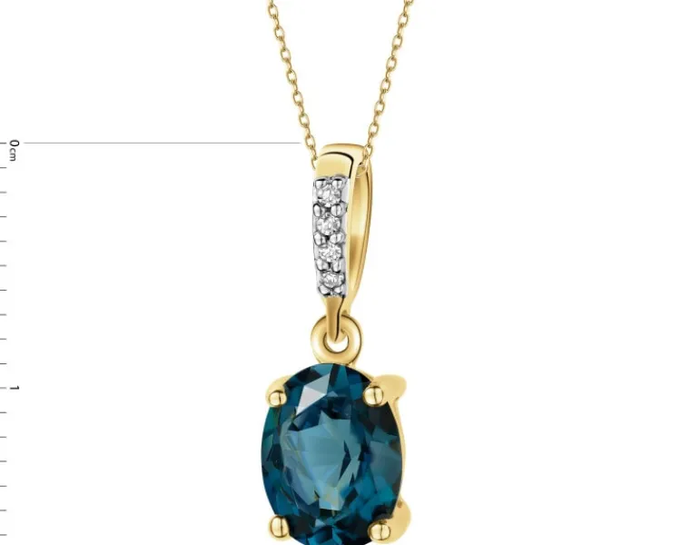 Apart Zawieszka z żółtego złota z diamentami i topazem London Blue - próba 585