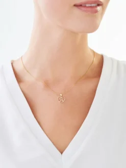 Apart Zawieszka z żółtego złota z diamentem - litera P, serce - 0,005 ct - próba 375< Zawieszki