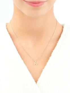 Apart Zawieszka z żółtego złota z diamentem - litera N - 0,003 ct - próba 375< Wszystkie